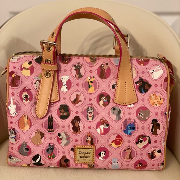 Dooney & Bourke Handbags - Brand new Dooney and Bourke rare Disney dogs satchel